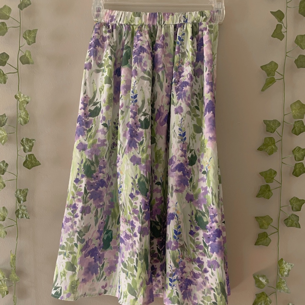 Purple floral skirt with stretch band waist.